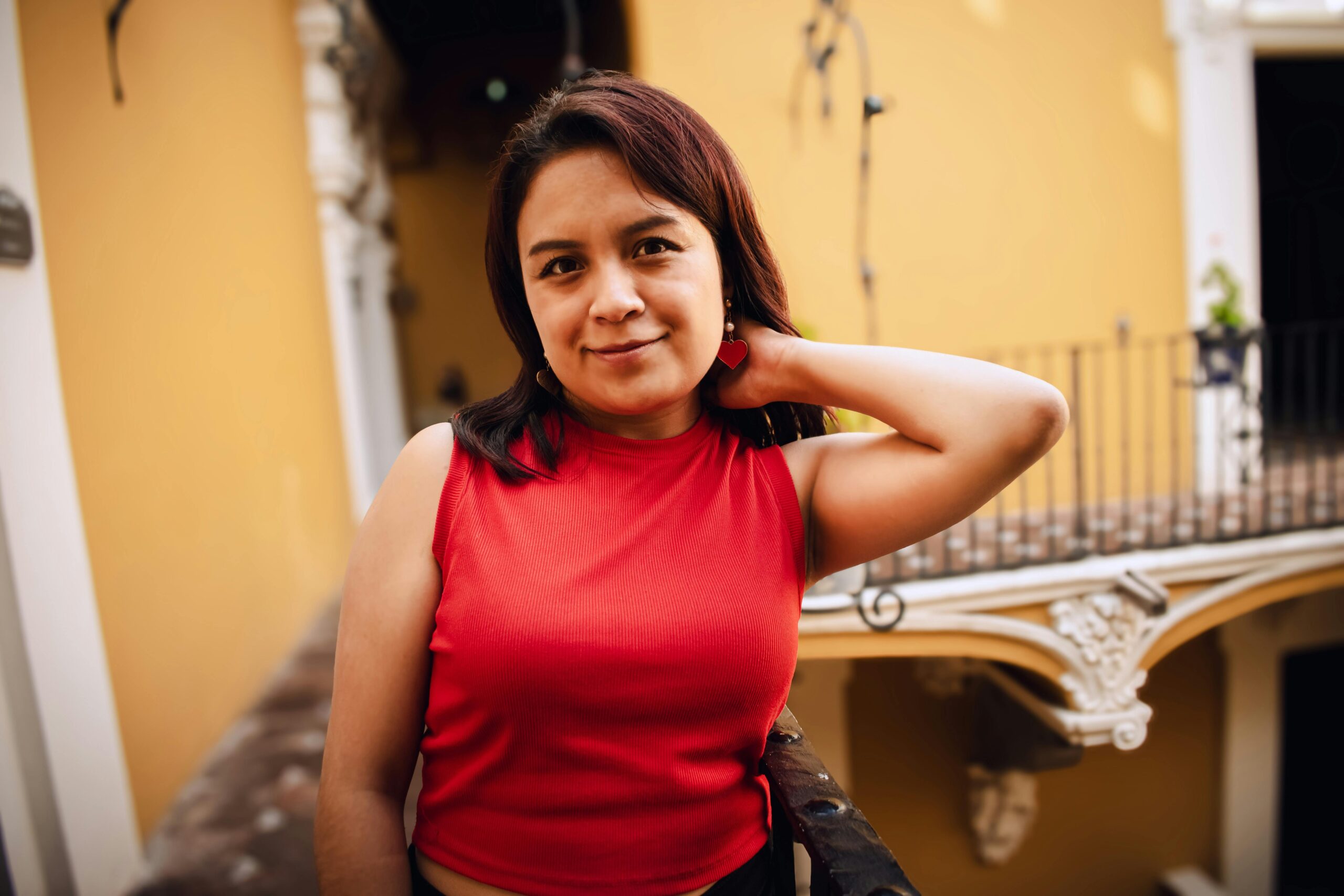 Charming portrait of a woman in a red top in Puebla, Mexico